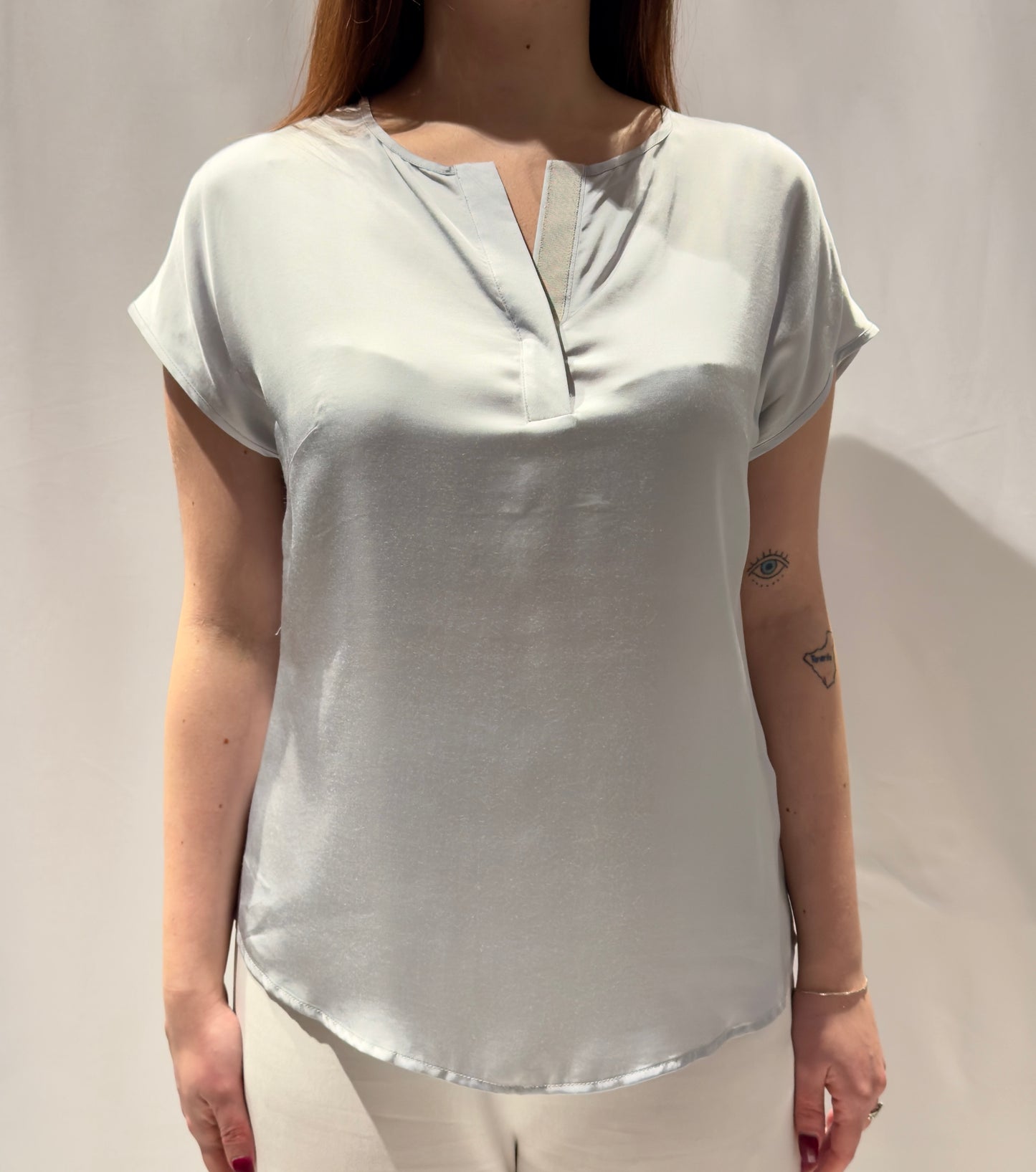 blusa con manica aletta